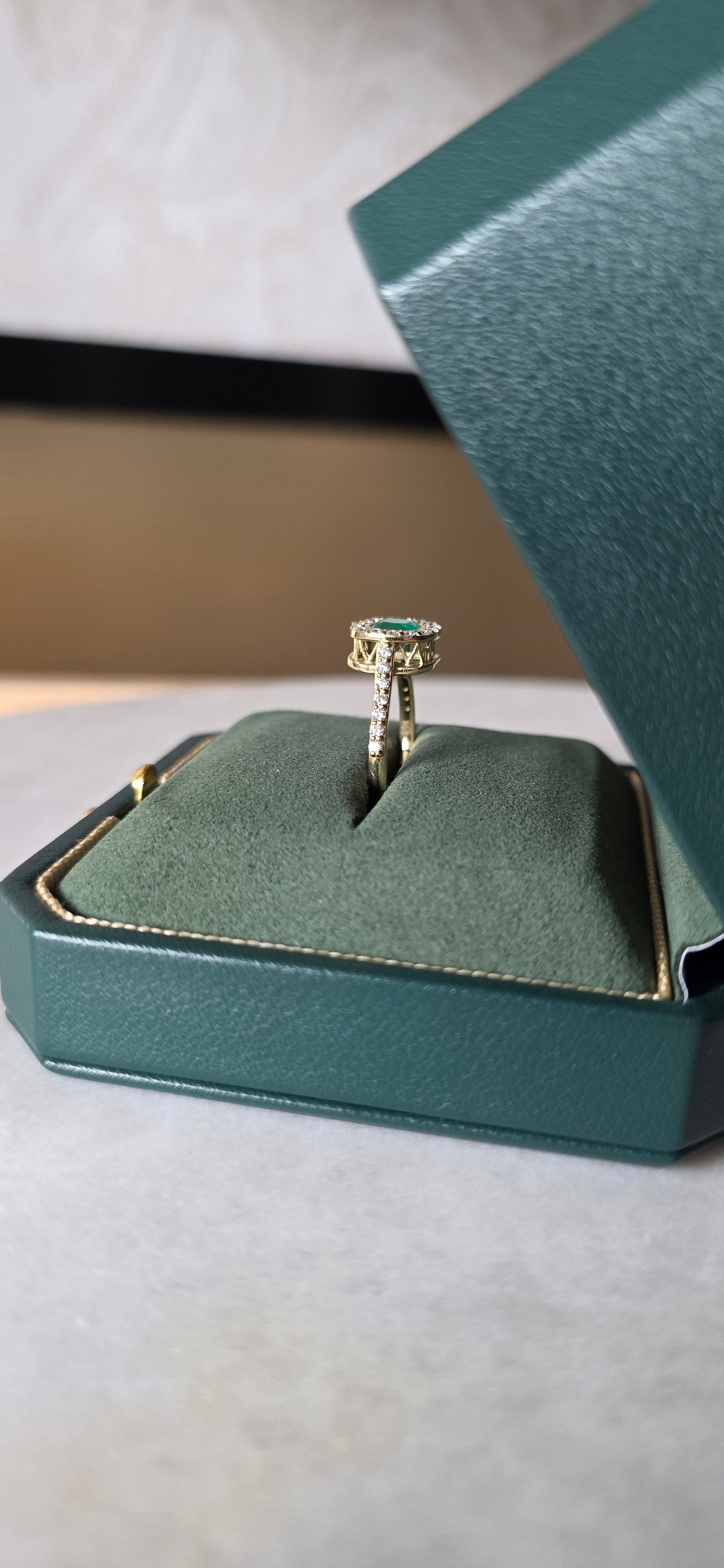 emerald and diamond engagement ring