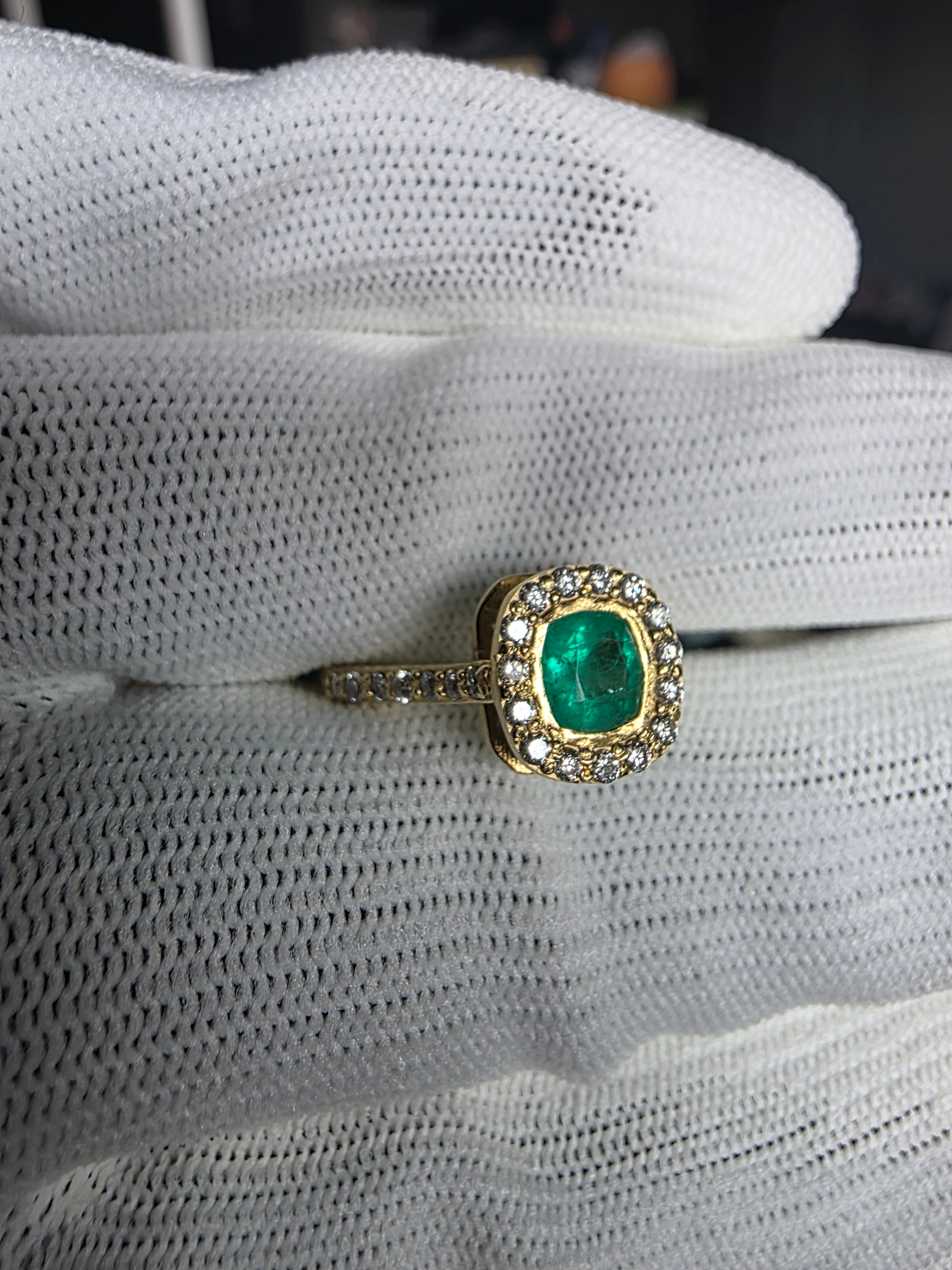 0.62 CT cushion Emerald with diamond halo ring