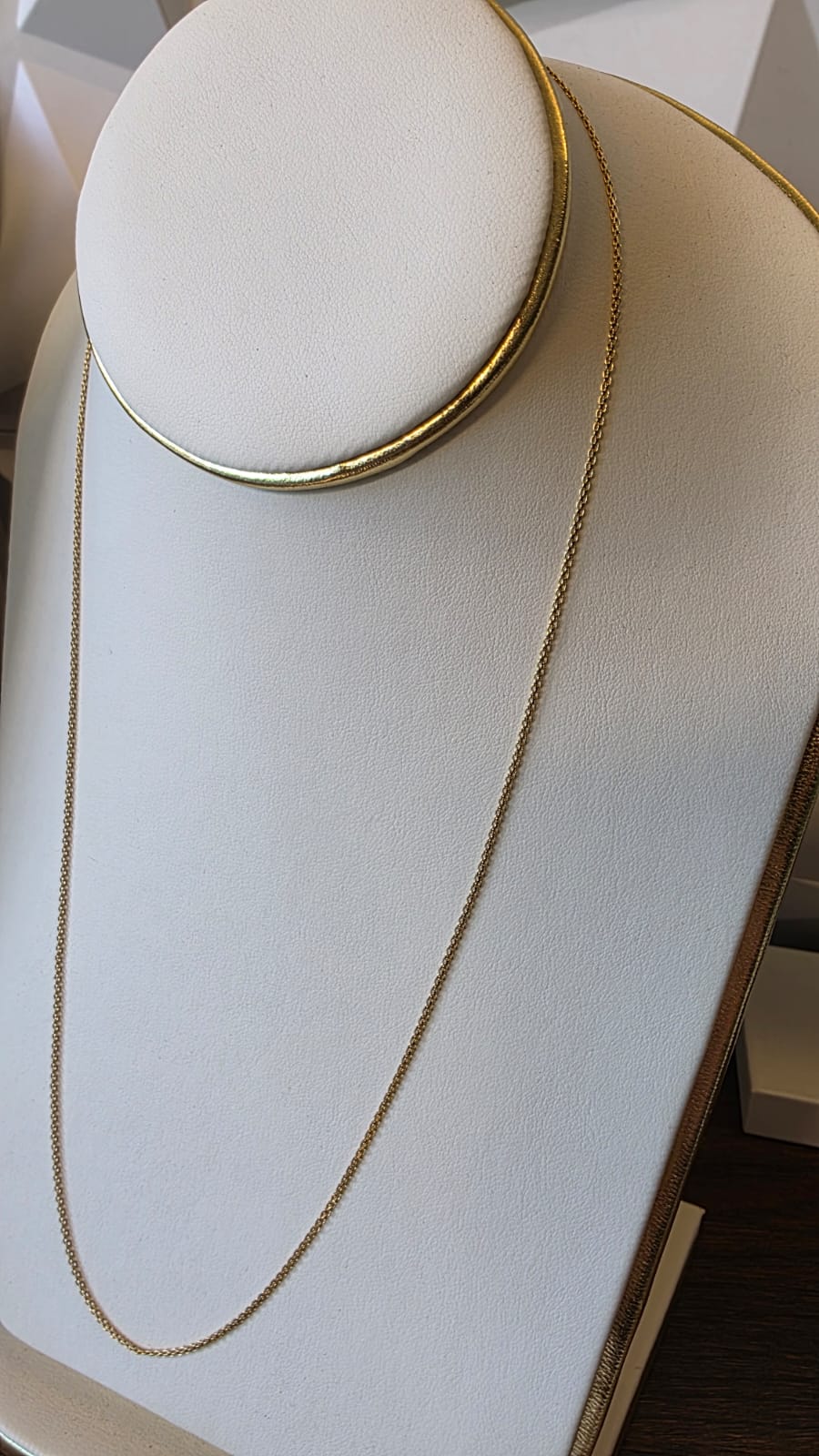 chino link chain in 18K solid gold, studio shot on white necklace display | Gado Jewellers, Mississauga Ontario Fine Jewelry