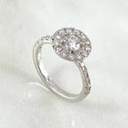 White Gold ring with a diamond on a white background