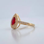 Pear-shaped halo engagement ring foundation with a ruby centrestone and double diamond halo and pavé-set shoulders