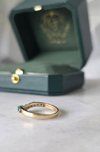 Close-up of emerald stone and setting on chevron ring in 18K gold | Gado Jewellers Fine Jewellery 
