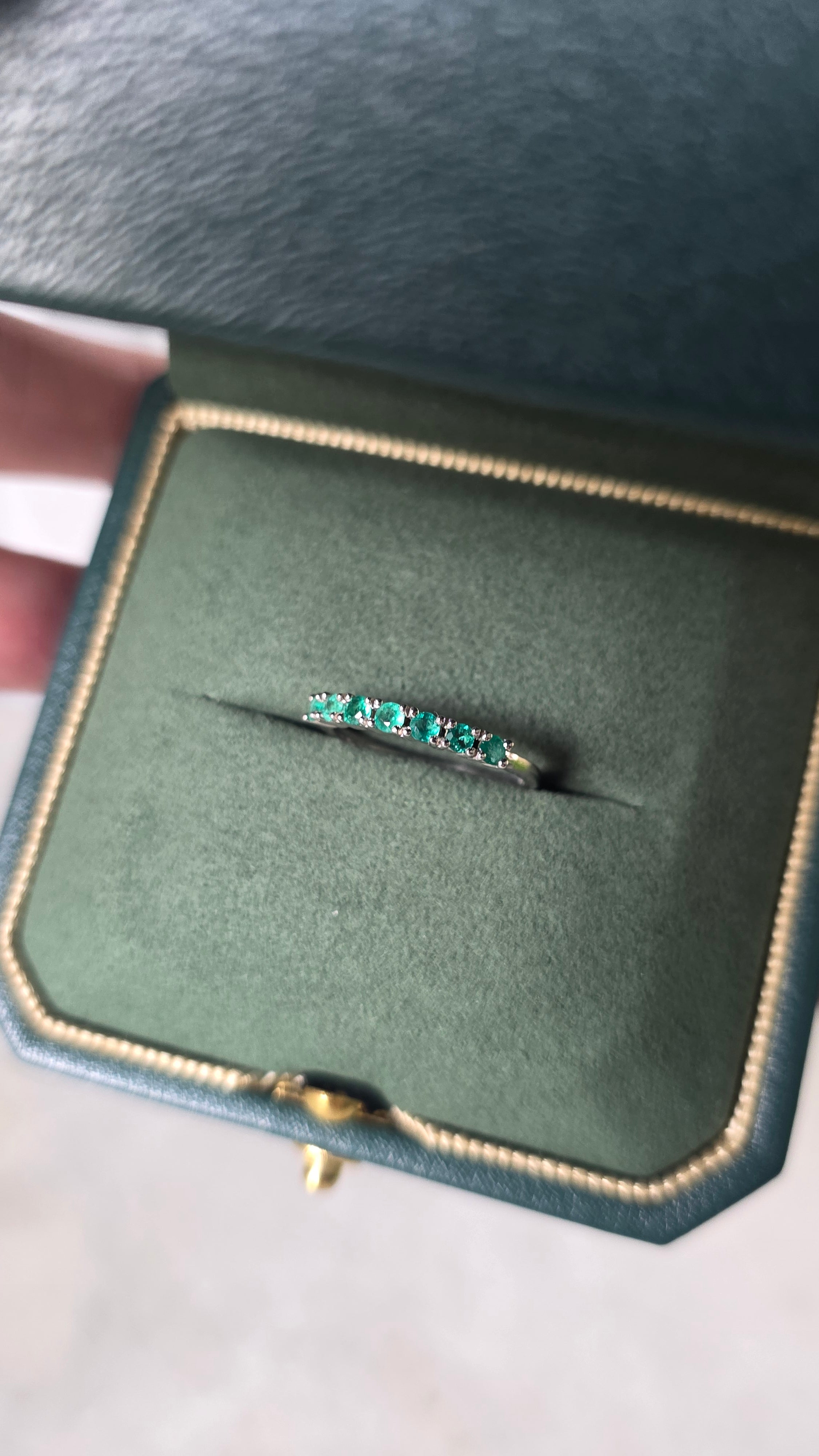 Colombian emerald band ring in Gado green jewelry box, 18K white gold