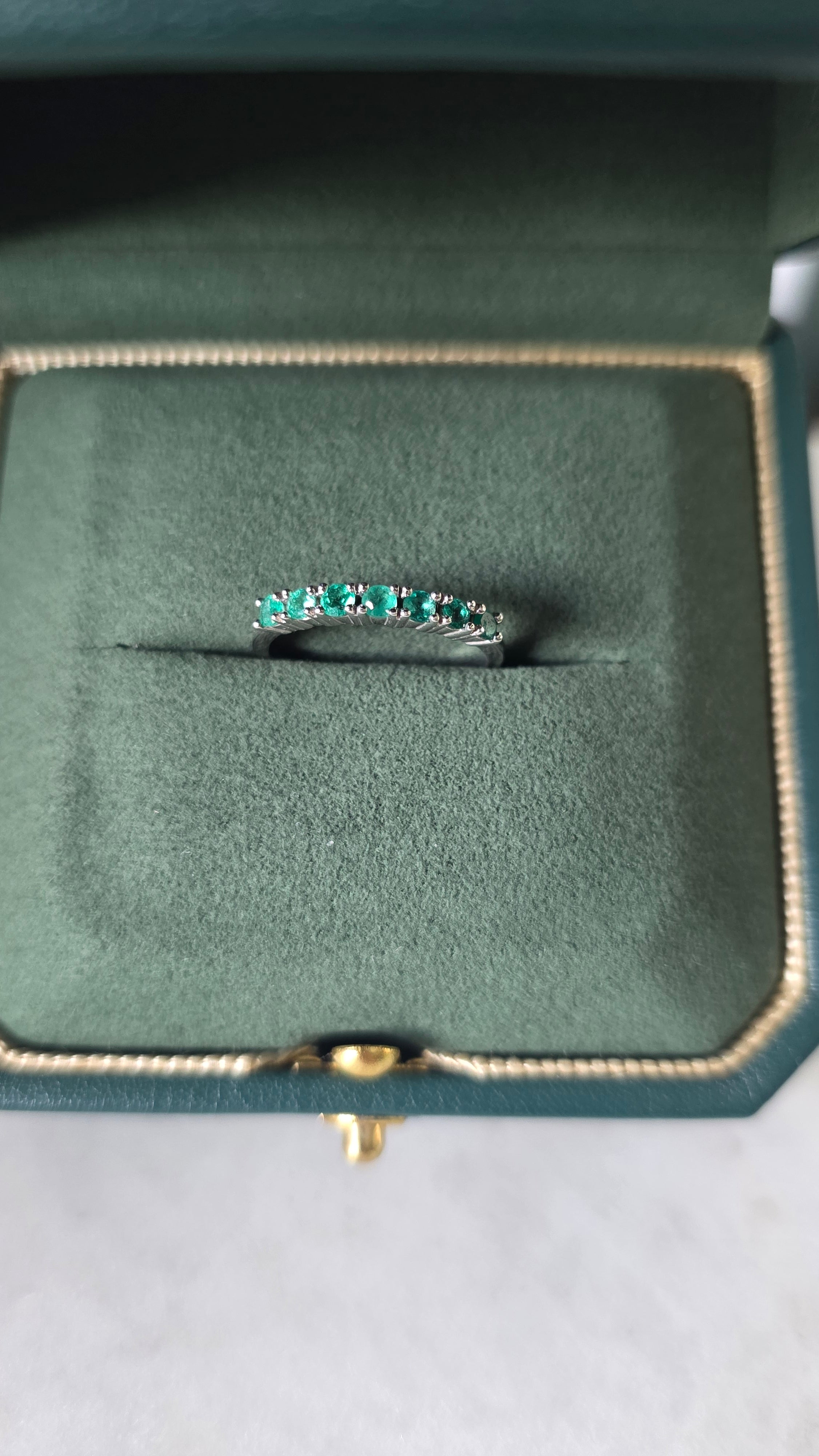 Colombian emerald band ring in Gado green jewelry box, 18K white gold"