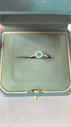 Colombian emerald halo ring in Gado green jewelry box, 18K white gold