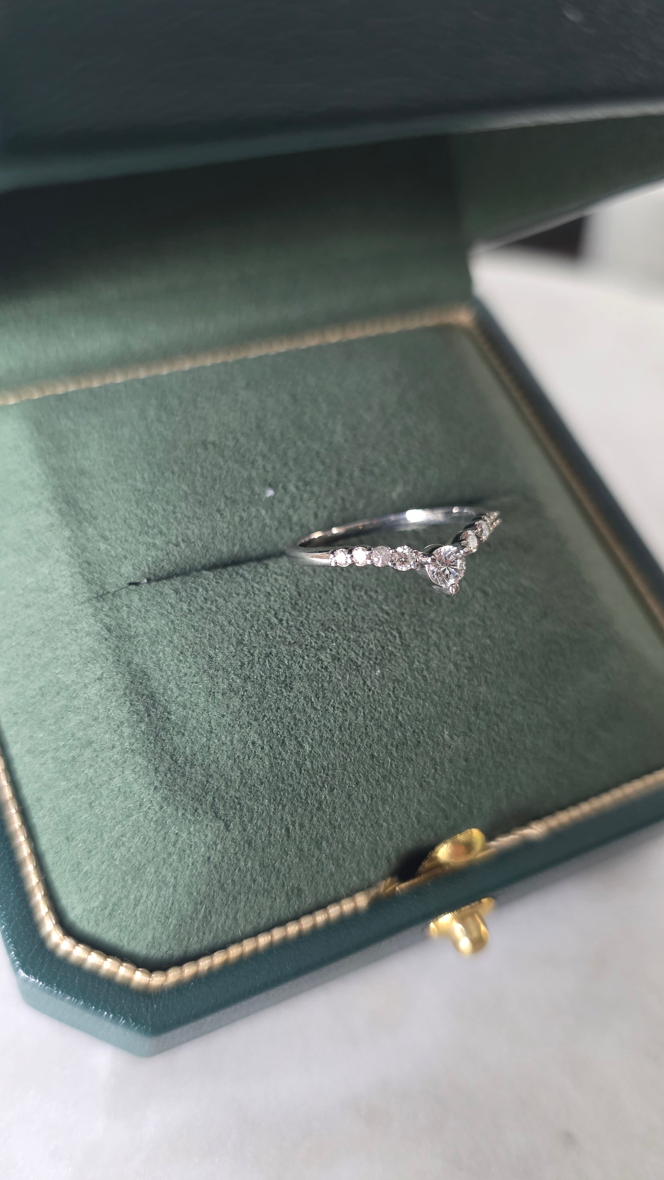 Diamond chevron ring in Gado green jewelry box, 18K white gold