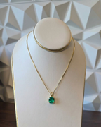 Muzo emerald pendant on Venetian box chain in 18K gold, studio shot | Gado Jewellers Canada Fine Jewellery Mississauga 