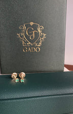 natural Colombian emerald stud earrings in 18K gold, studio shot | Gado Jewellers Fine Jewelry Canada Custom Designs