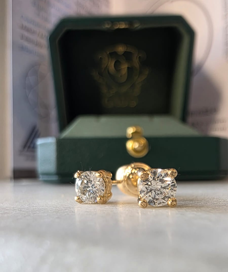 natural diamond stud earrings in 18K gold, studio shot | Gado Jewellers, Canadian Fine Jewellery