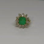 2.9CT emerald with pear diamond halo